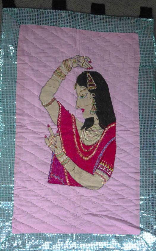 Quilt with dancing lady.
