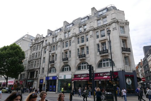 Building on corenre of Oxford Street and Rathbone Place.